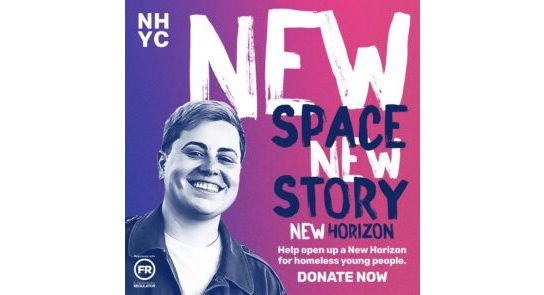 New space, new story. A young white person smiling with short dyed hair