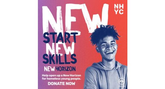 New start, new skills. A laughing young black man with afro hair and a hoodie